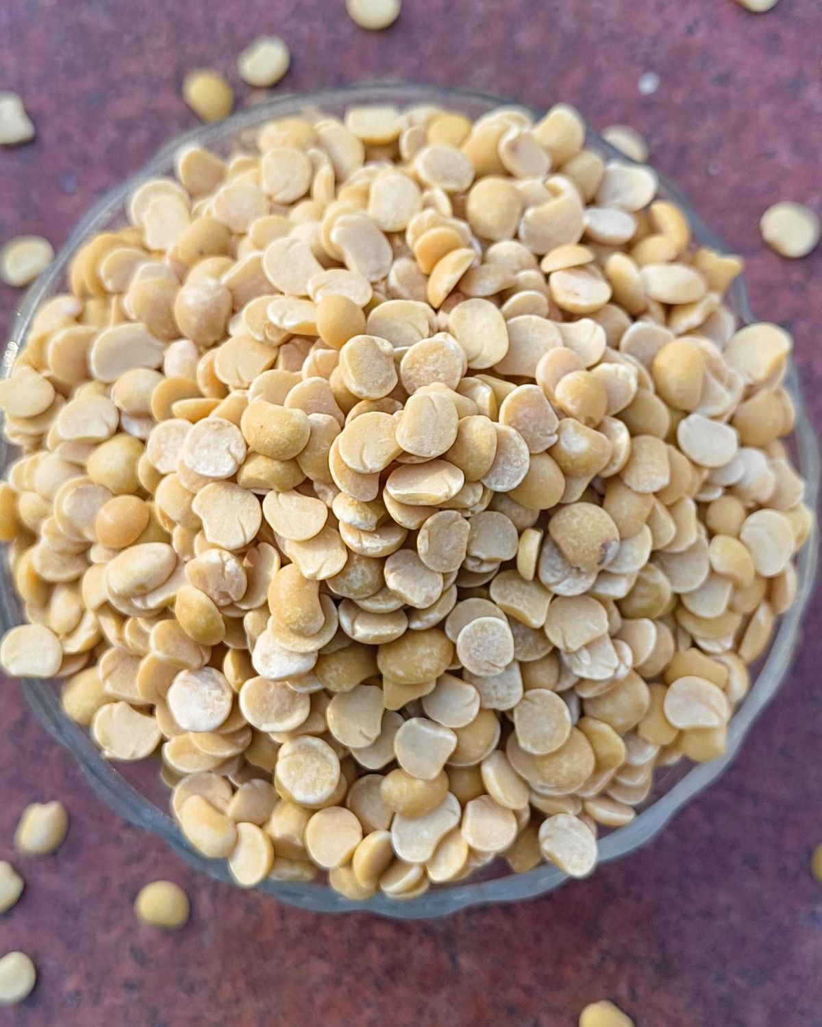 Unpolished toor dal mounded in bowl